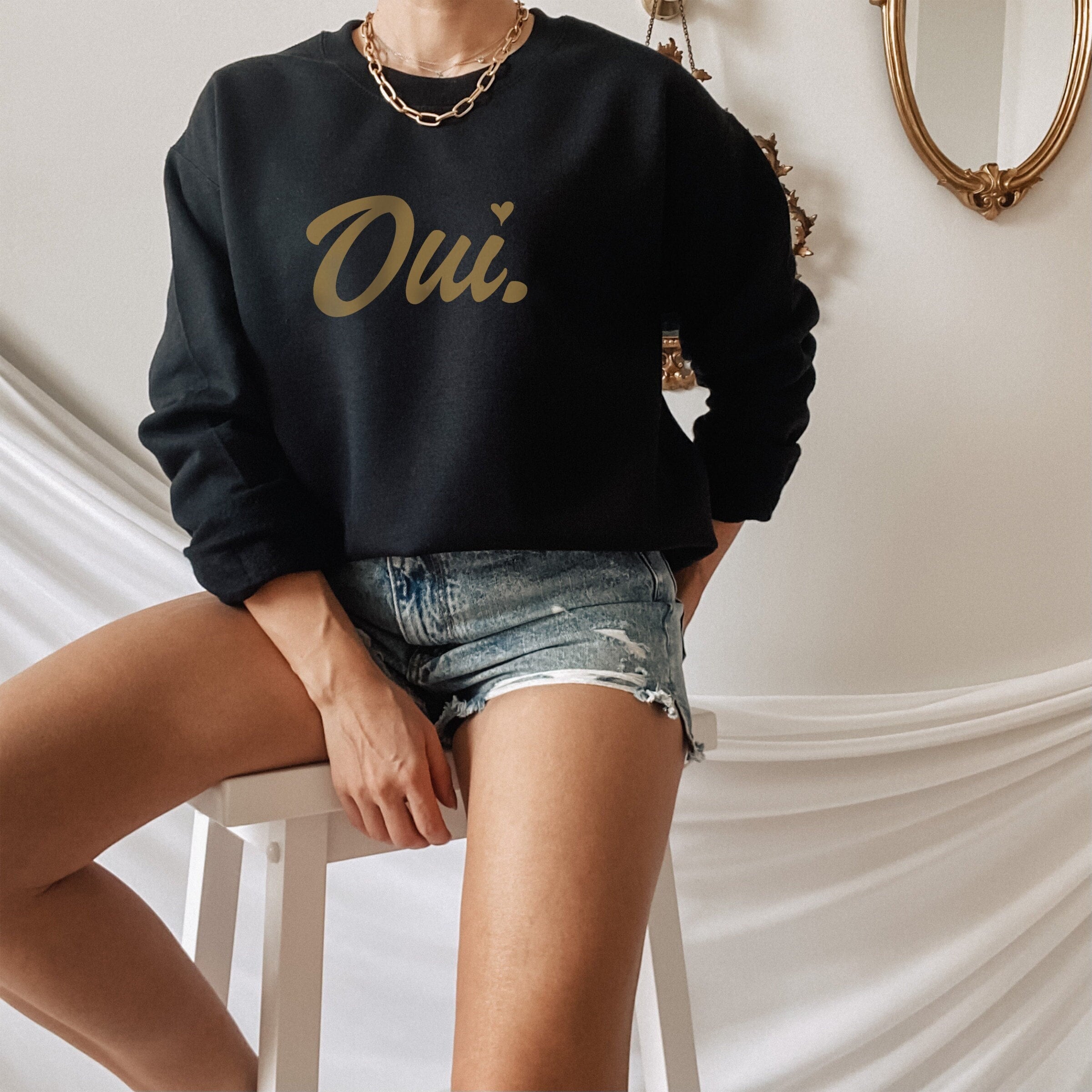 Black sweatshirt discount with gold writing